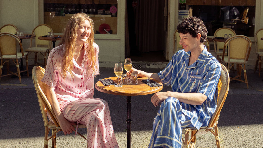 A couple wearing silk pajamas