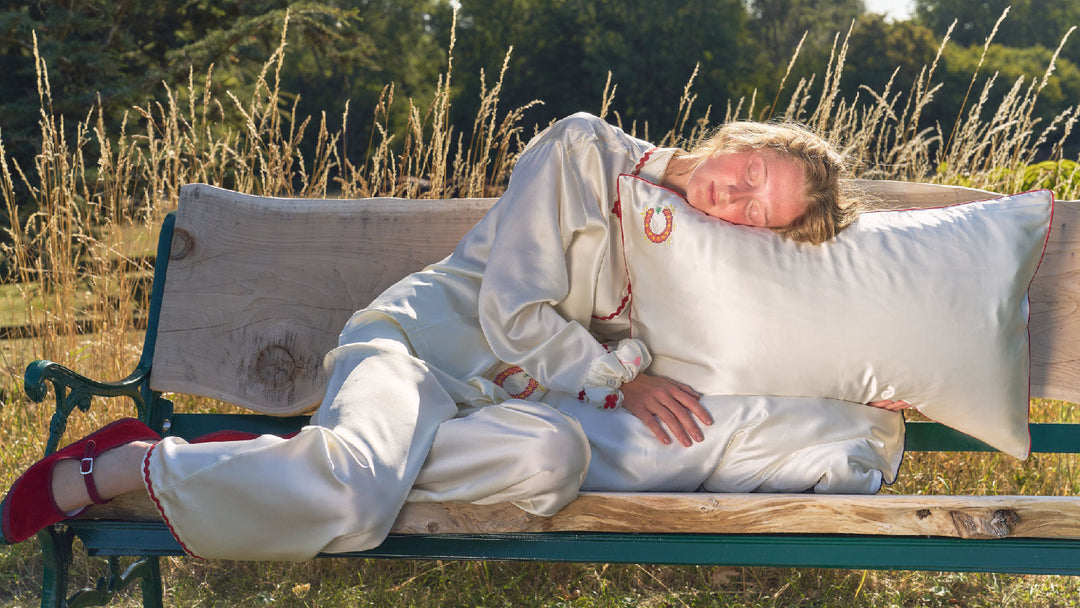 Women lied on a silk pillow comfortably.