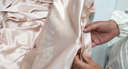 Embroidered silk pajama detail