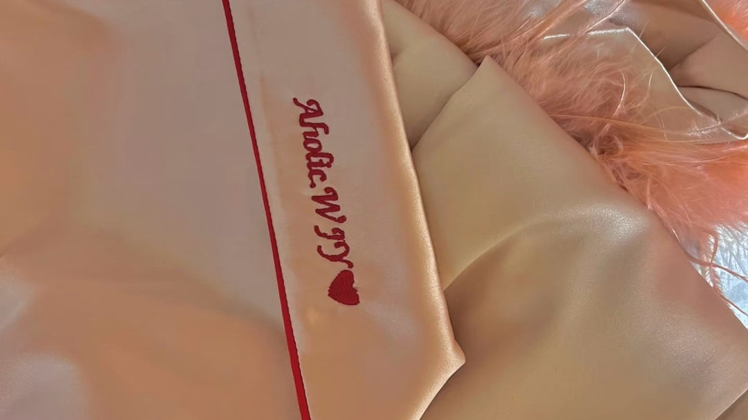 Embroidered silk pajamas with personalized name detail for wedding gifts