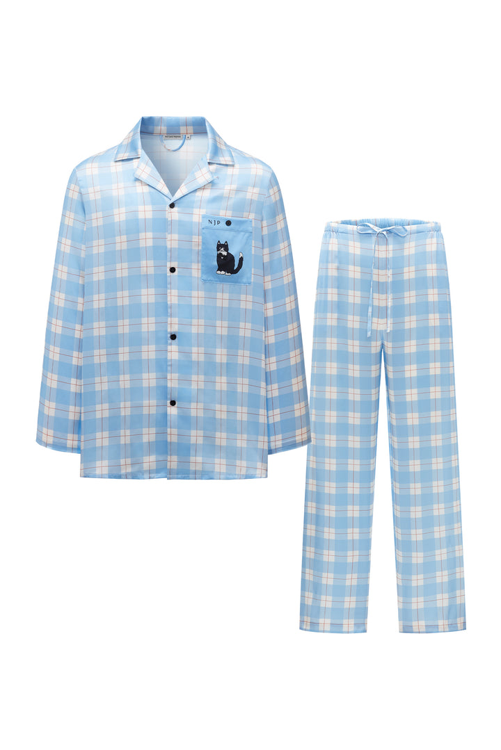 Blue and white checkered silk pajama set with a cat design on a white background