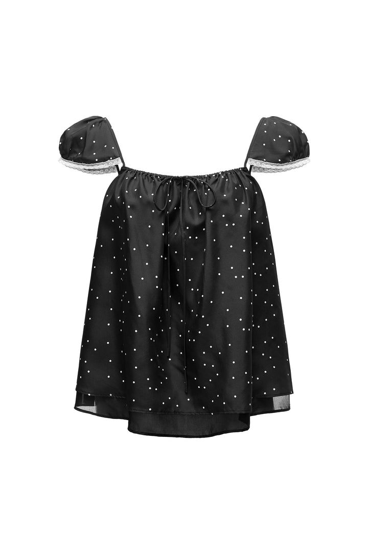 Black silk off-shoulder top on a white background