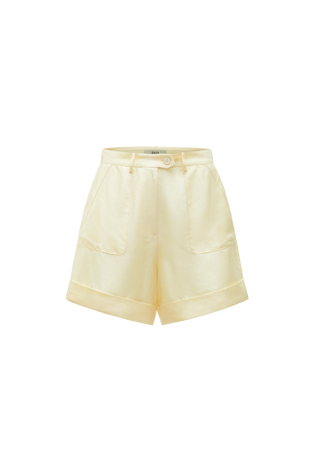 Light yellow silk shorts on a white background