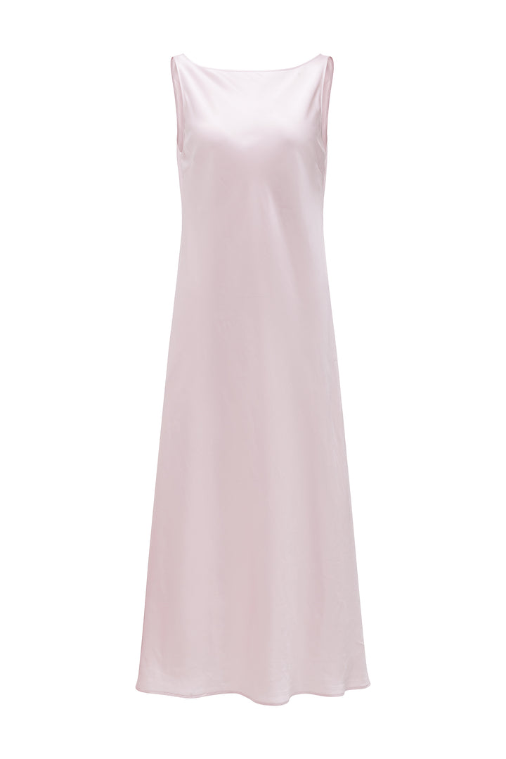 Pink silk slip dress on a white background