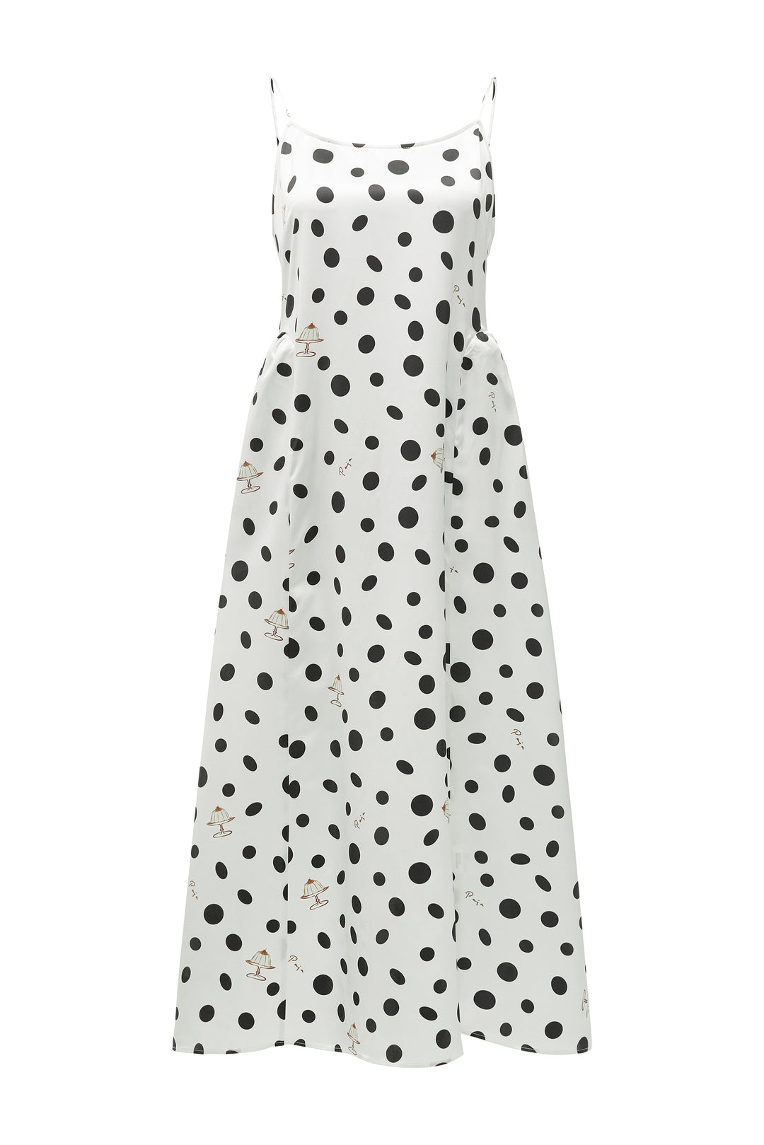 White silk dress with black polka dot pattern on a white background